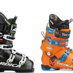 Dwa buty narciarskie: czarny Nordica Dobermann GP 130 i pomarańczowy Tecnica Cochise Pro 130. Gotowe do zapinania butów narciarskich.