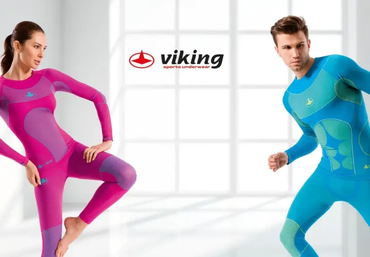 Kobieta w różowym i mężczyzna w niebieskim stroju sportowym. Bielizna termoaktywna Viking dla aktywnych.