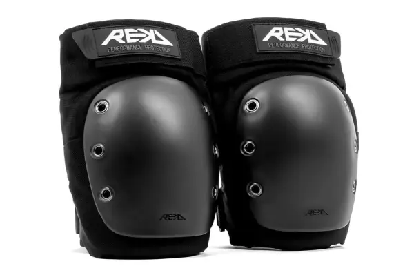 Para pewne ochraniacze na kolana snowboardowe marki REX. Solidne, czarne, z logo REX.
